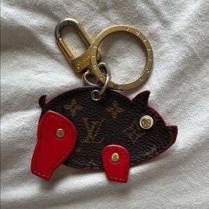Louis Vuitton Pig Bag Charm and Key Holder
Monogram Brown/Red